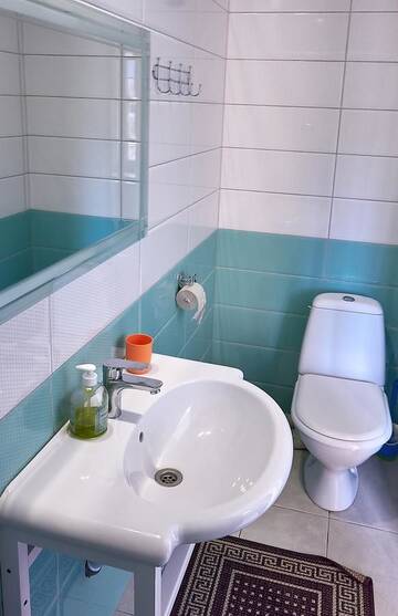 Фото номера Семейный номер с ванной комнатой и балконом Апартаменты Apartments on Voykova г. Полоцк 9