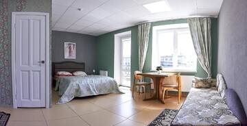 Фото номера Семейный номер с ванной комнатой и балконом Апартаменты Apartments on Voykova г. Полоцк 12